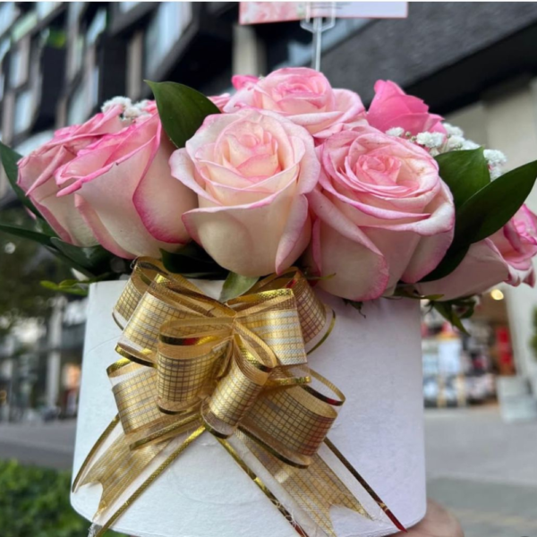 Espiral - Centro de mesa de Flores rosadas💐